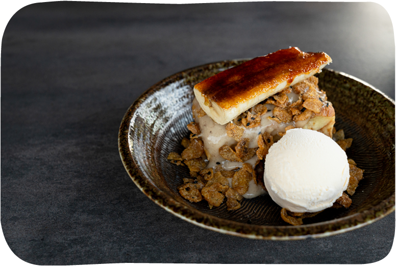 Dessert with caramelized top and ice cream